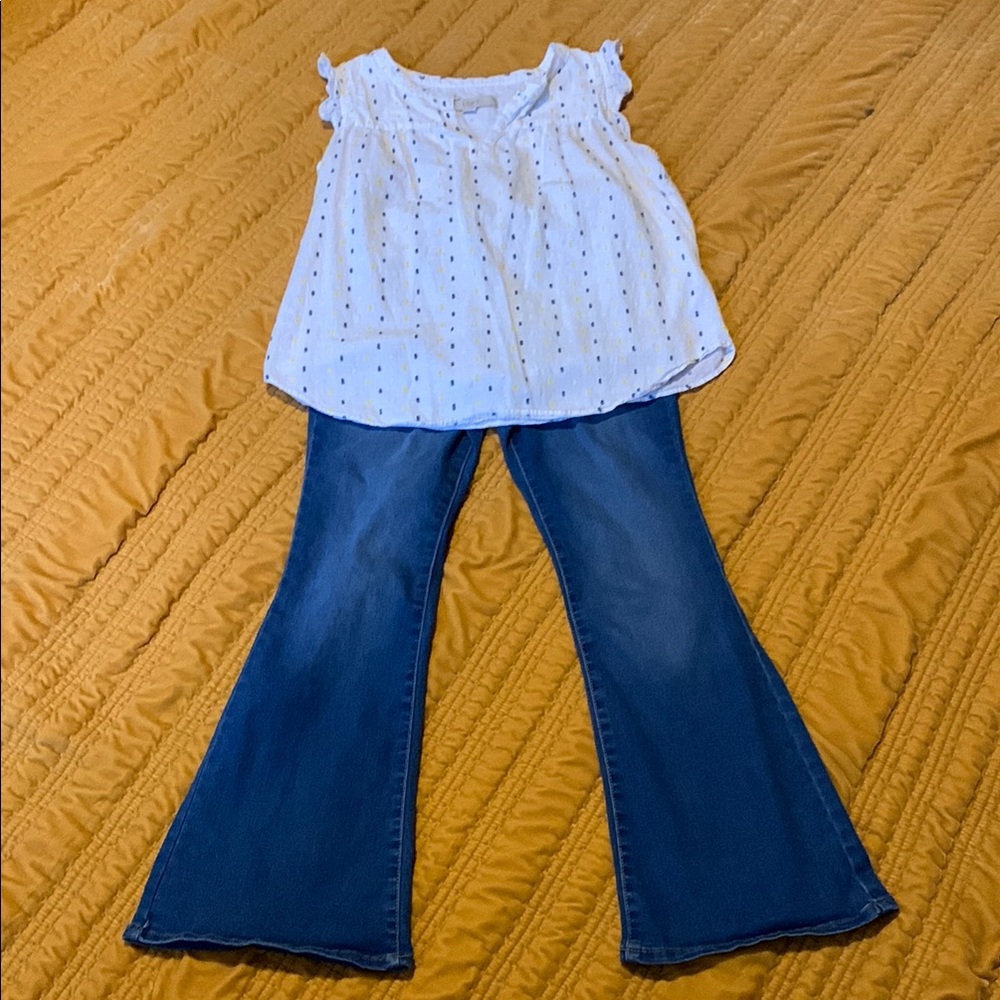 White Polka Dot Blouse and Blue Flare Jeans